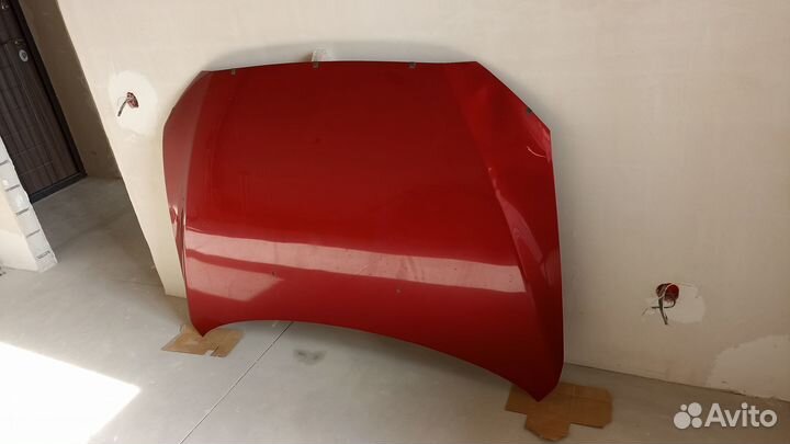 Капот Mitsubishi Lancer X