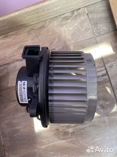 Моторчик отопителя на Опель/Шевроле