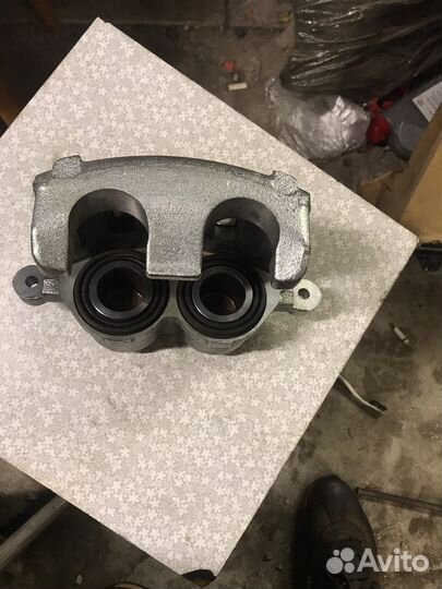 Суппорт передний Шевроле Каптива Опель Антара