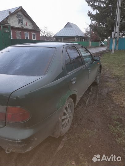 Nissan Almera 1.6 AT, 1997, 250 000 км