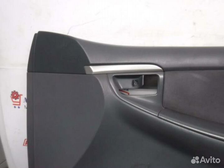 Обшивка двери передняя правая Toyota Corolla 124