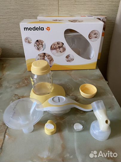 Молокоотсос medela ручной