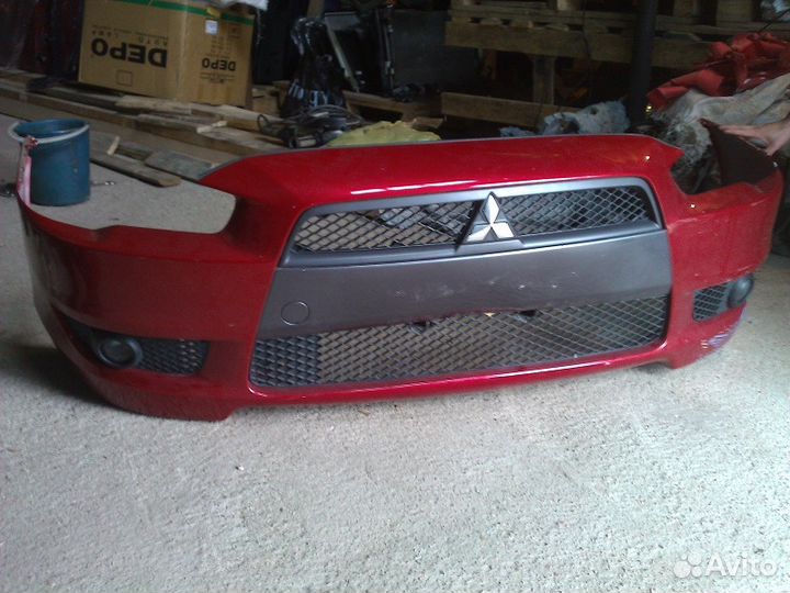 Передний бампер лансер 10