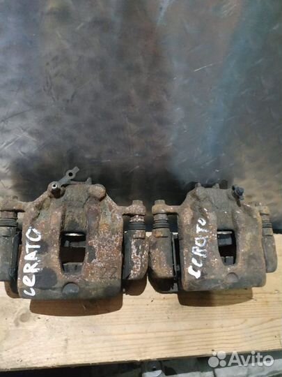 Суппорт тормозной передний Kia cerato 09-13