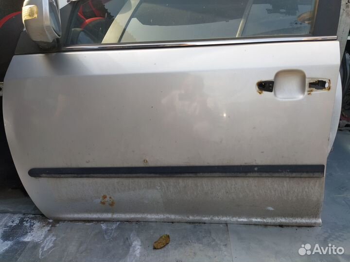 Дверь передняя левая Geely MK Cross