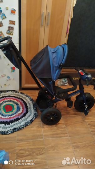 Детский велосипед с ручкой