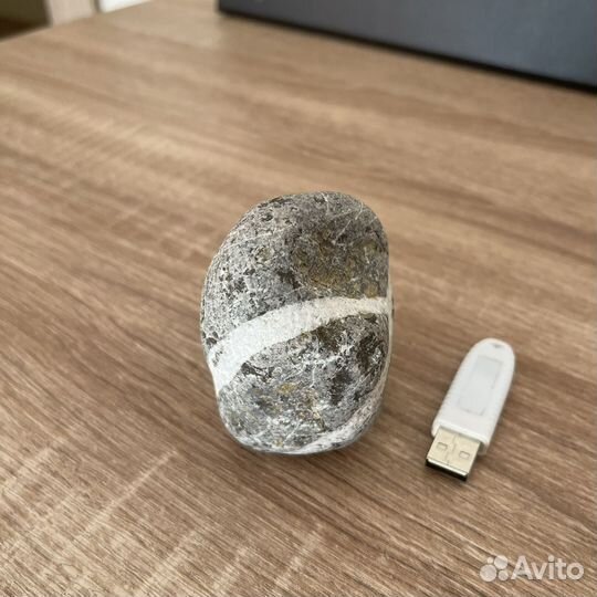 Камень с символом 