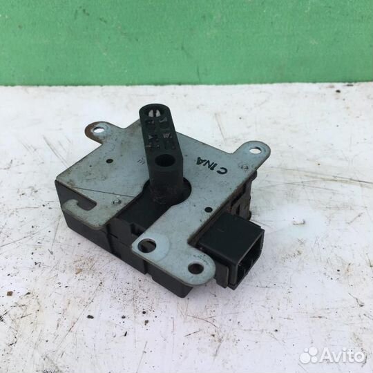 Моторчик заслонки отопителя Киа Спектра