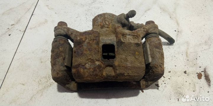 Суппорт тормозной задний правый Mitsubishi