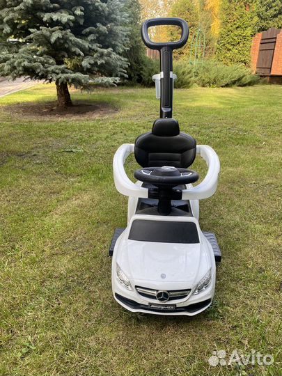 Машинка каталка с ручкой