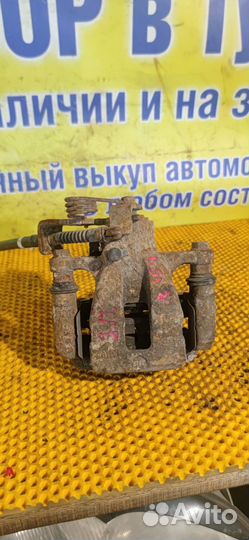 Суппорт тормозной задний правый Kia Rio