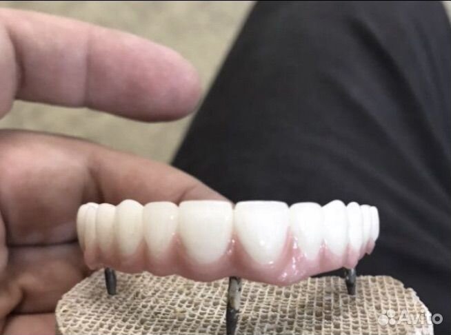 Зубной техник