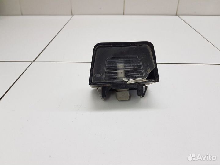 Фонарь подсветки номера левый (Ford Transit viii)