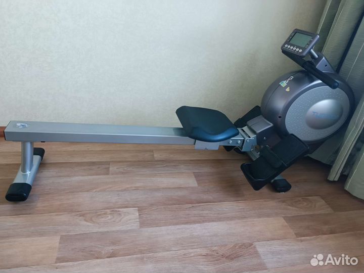 Гребной тренажер