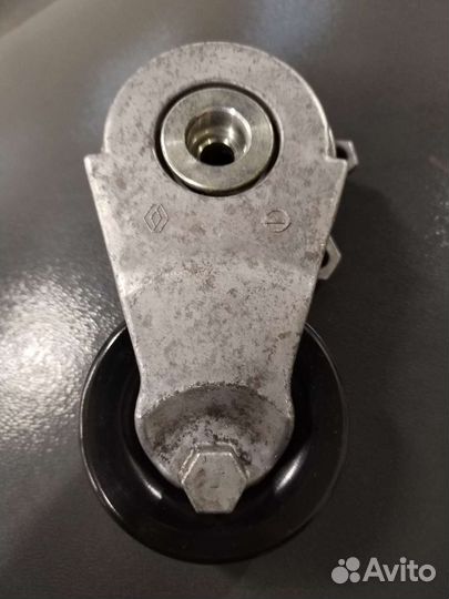 Ролик с натяжителем nissan