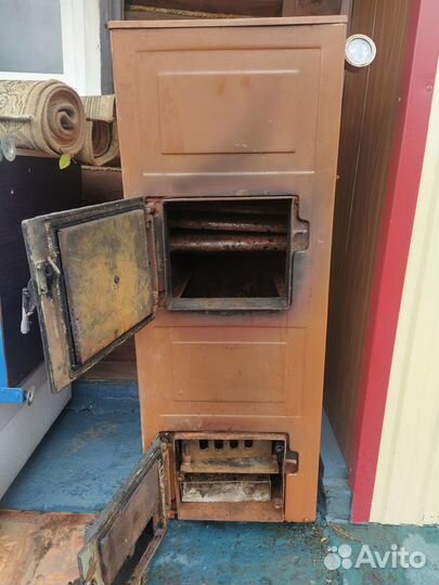 Твердотопливный -газовый котел изтм