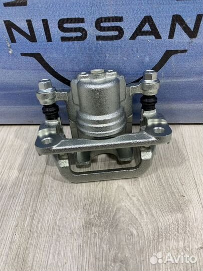 Суппорт тормозной задний Nissan qashqai J10 Прав