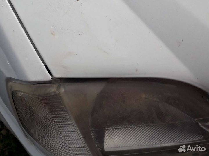 Капот на рено логан