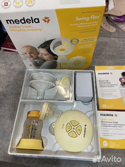 Молокоотсос medela swing flex электрический