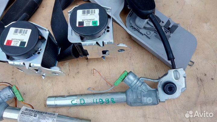 Преднатяжитель ремня передний на Опель Корса Д