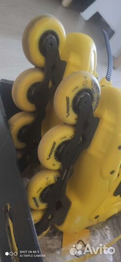 Роликовые коньки