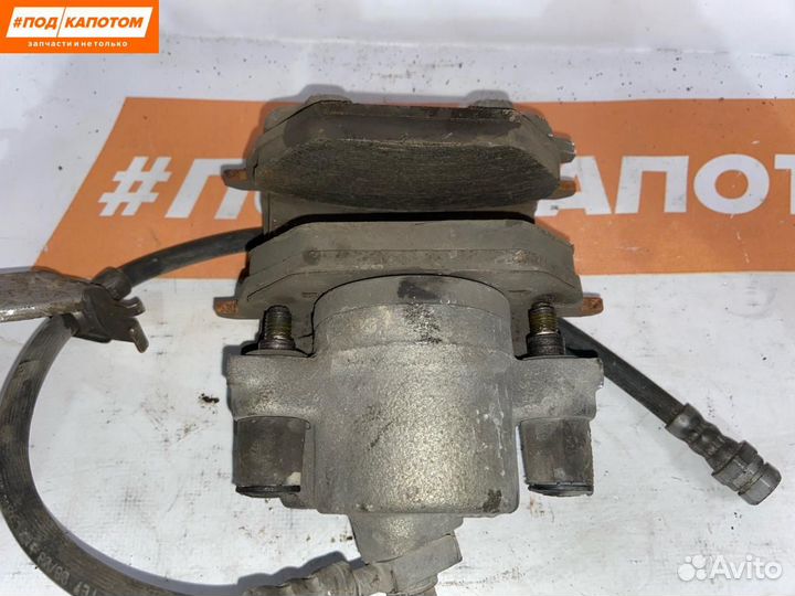 Суппорт тормозной передний правый Volkswagen Polo