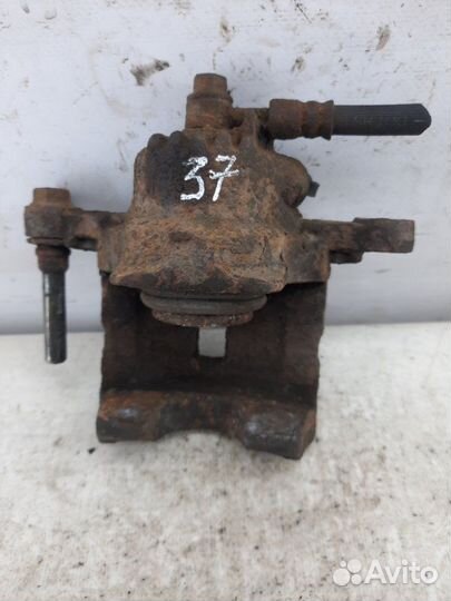 Суппорт тормозной задний правый Kia Sorento