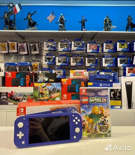 Nintendo Switch Lite Blue Edition + Lego Worlds