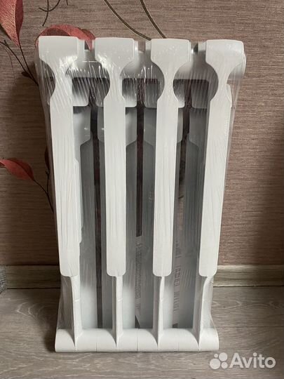 Биметаллический радиатор 4 секции