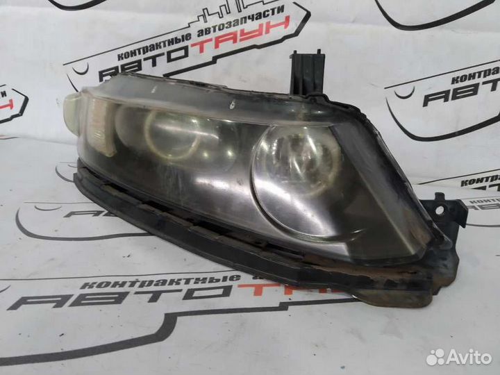 Фара honda odyssey RB1 RB2 10022497 xenon левая пр