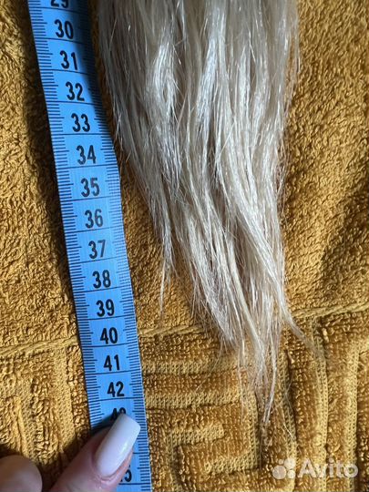 Хвост из натуральных волос на ленте блонд