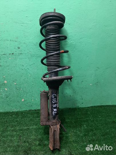 Стойка амортизатора задняя левая Subaru Forester