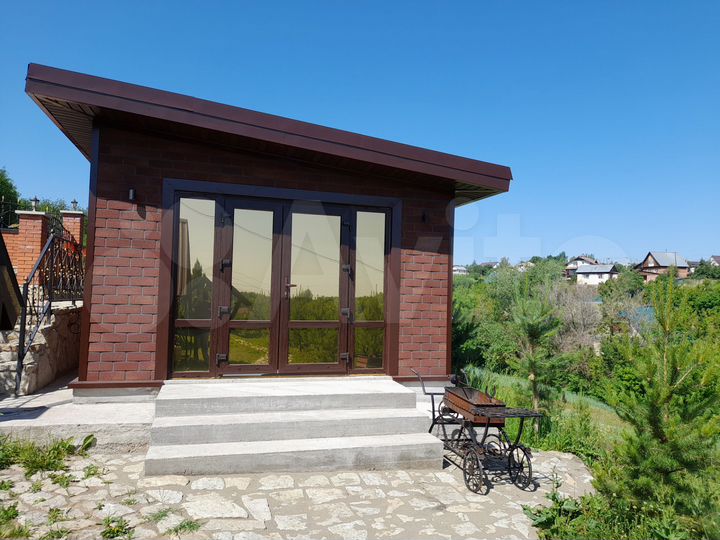 Коттедж 452 м² на участке 24 сот.