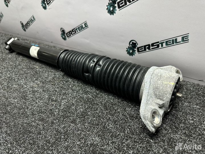 Амортизатор задний левый Kia Sportage 4 QL 2021