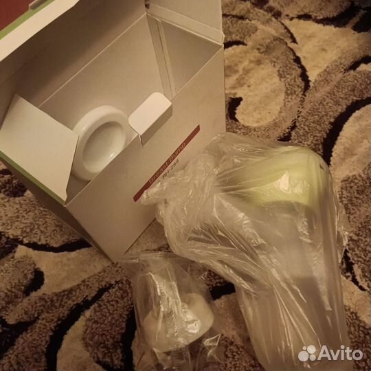 Молокоотсос электрический