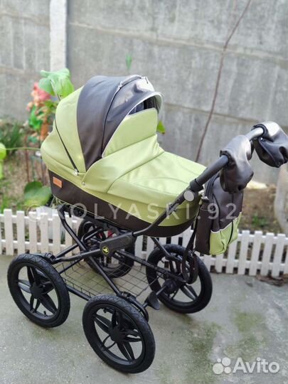 Коляска из эко кожи 2 в 1