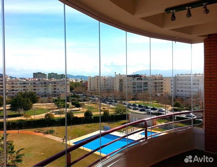 Безрамное раздвижное остекление