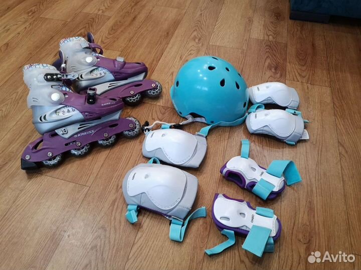 Роликовые коньки