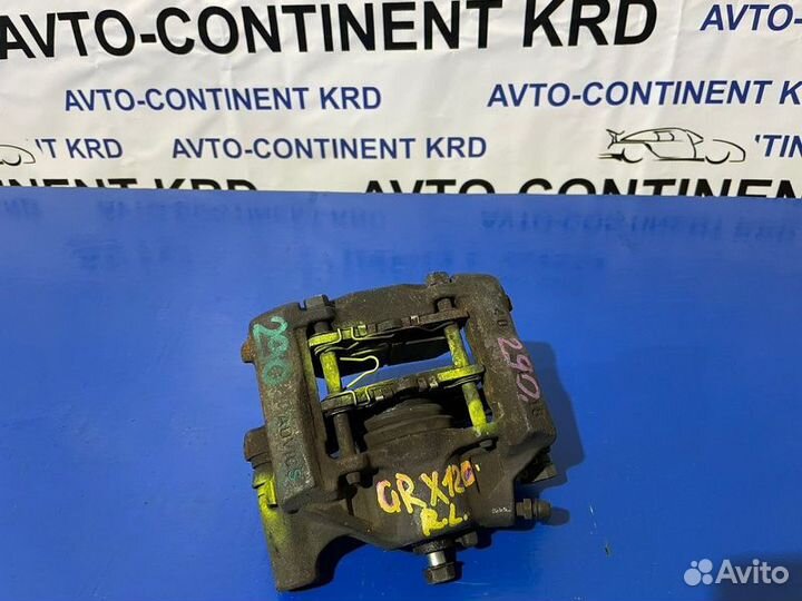 Суппорт тормозной задний левый Toyota Mark X