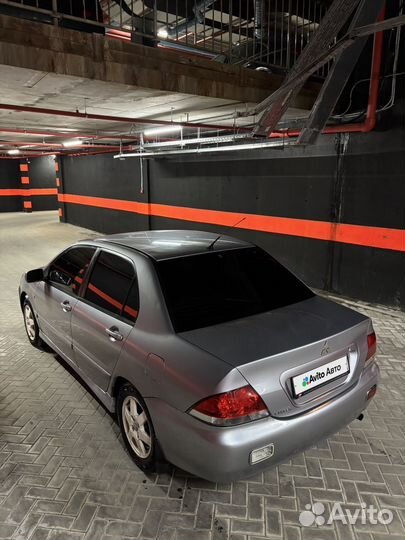 Mitsubishi Lancer 1.6 AT, 2004, 290 000 км