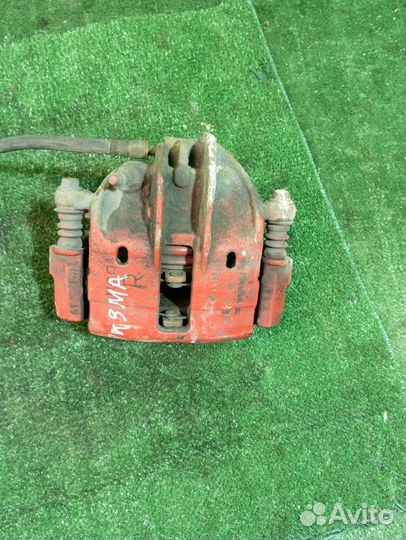 Суппорт тормозной передний правый Mitsubishi Caris