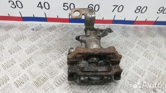 Суппорт тормозной задний правый toyota avensis T27