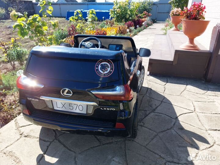 Детский электромобиль двухместный