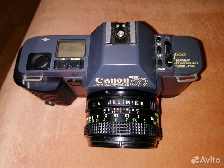 Плёночный фотоаппарат. Саnon t70. Minolta x-7