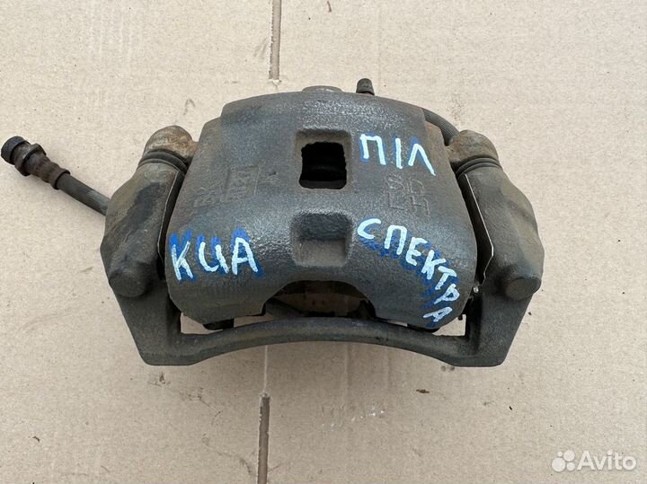 Суппорт передний левый Kia Spectra