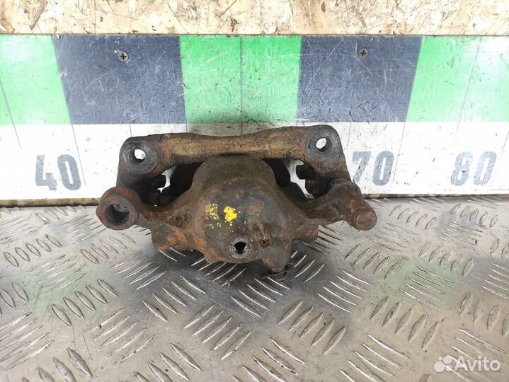 Суппорт передний левый Hyundai Accent 1994-2000