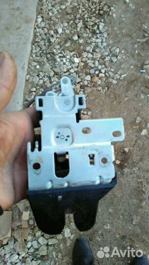 Замок багажника Мицубиси Лансер 9