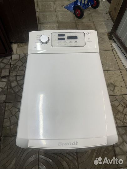 Стиральная машина с вертикальной загрузкой Brandt