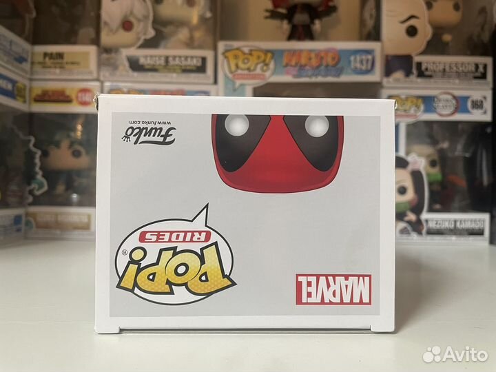 Funko pop Deadpool on scooter