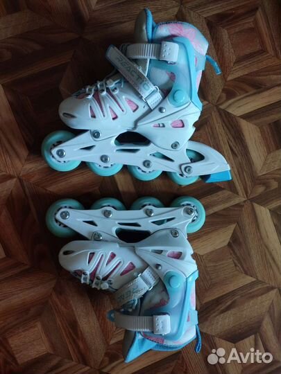 Роликовые коньки